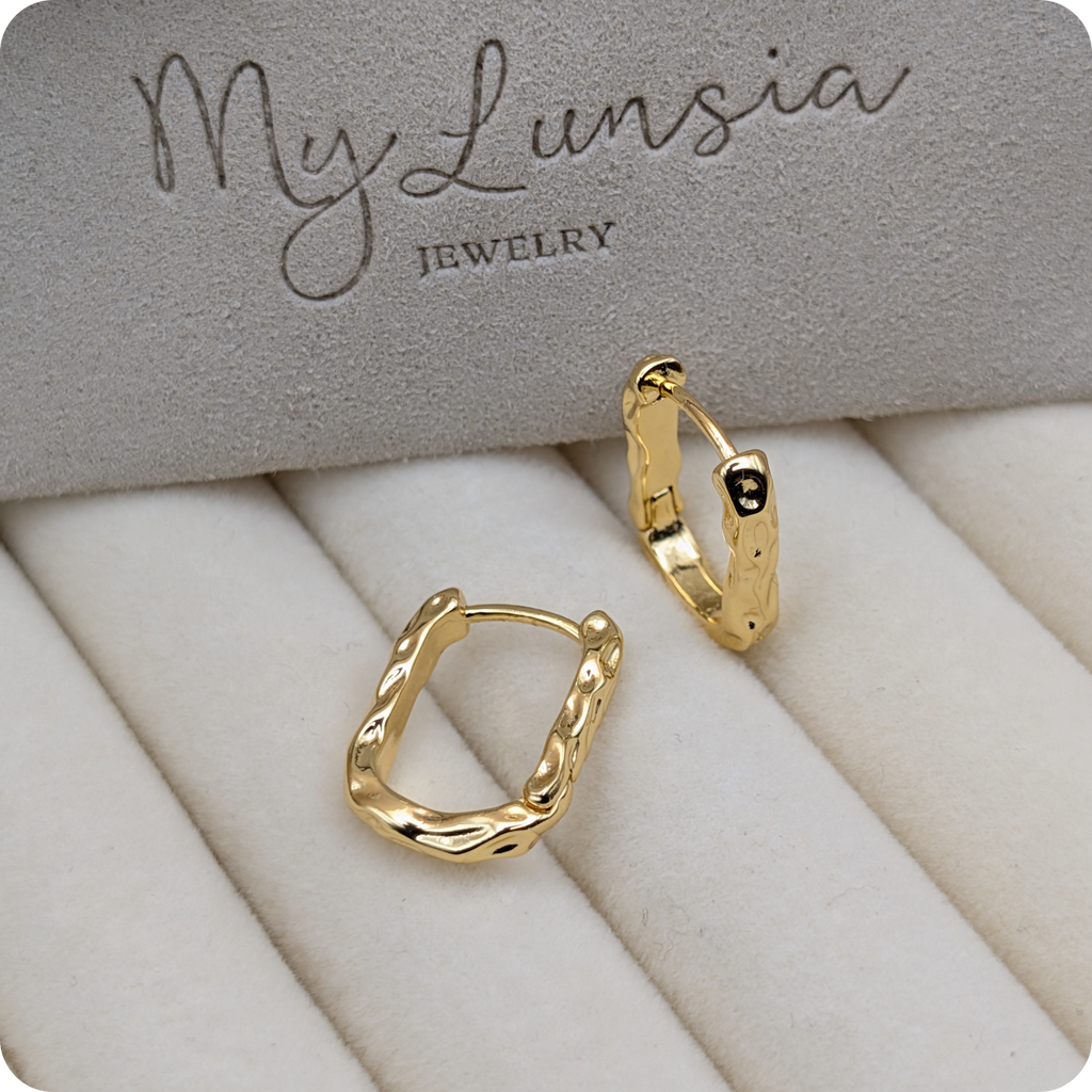 Boucles d'oreilles torsadées plaquées or 14 carats