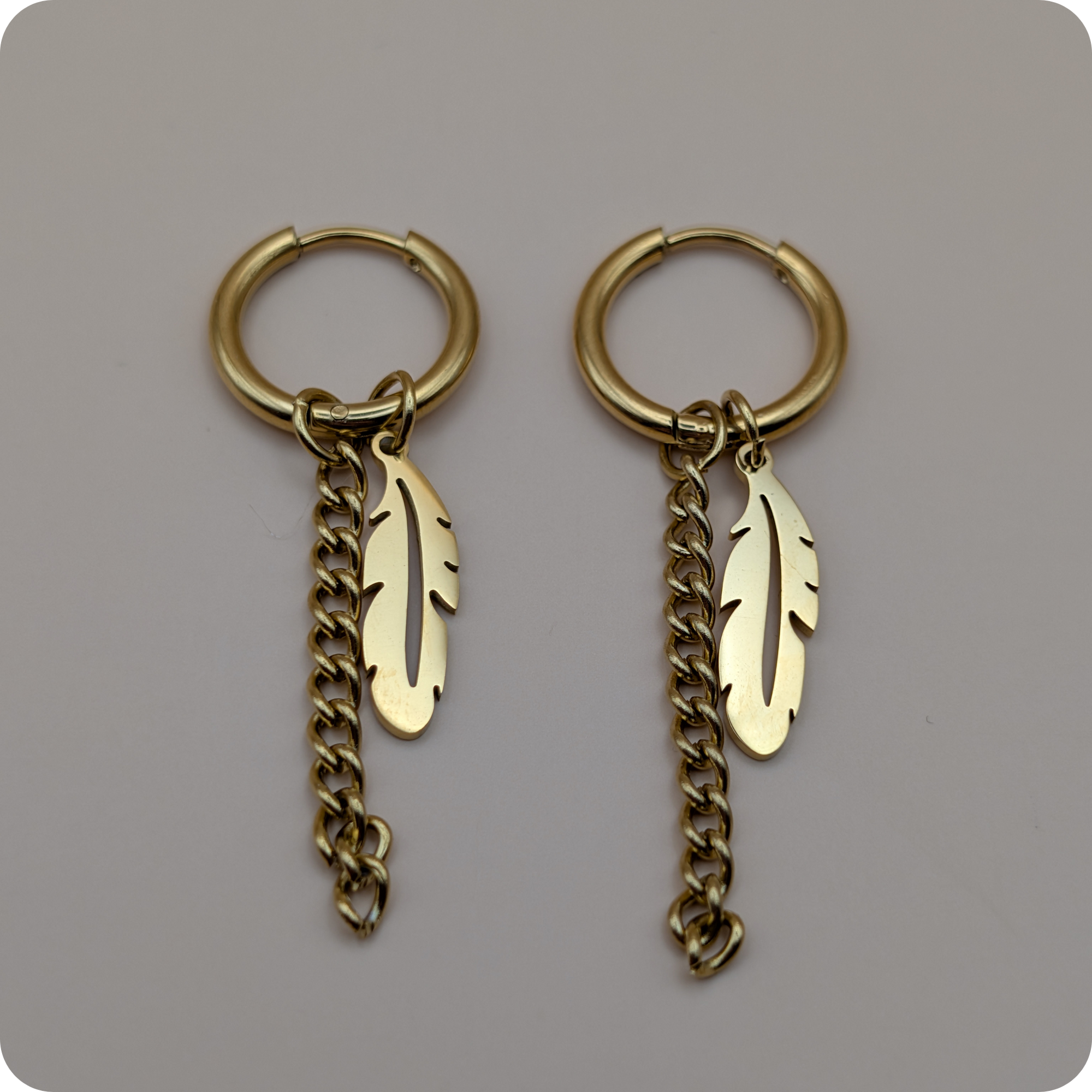 Boucles d'oreilles plumes plaquées or 14 carats