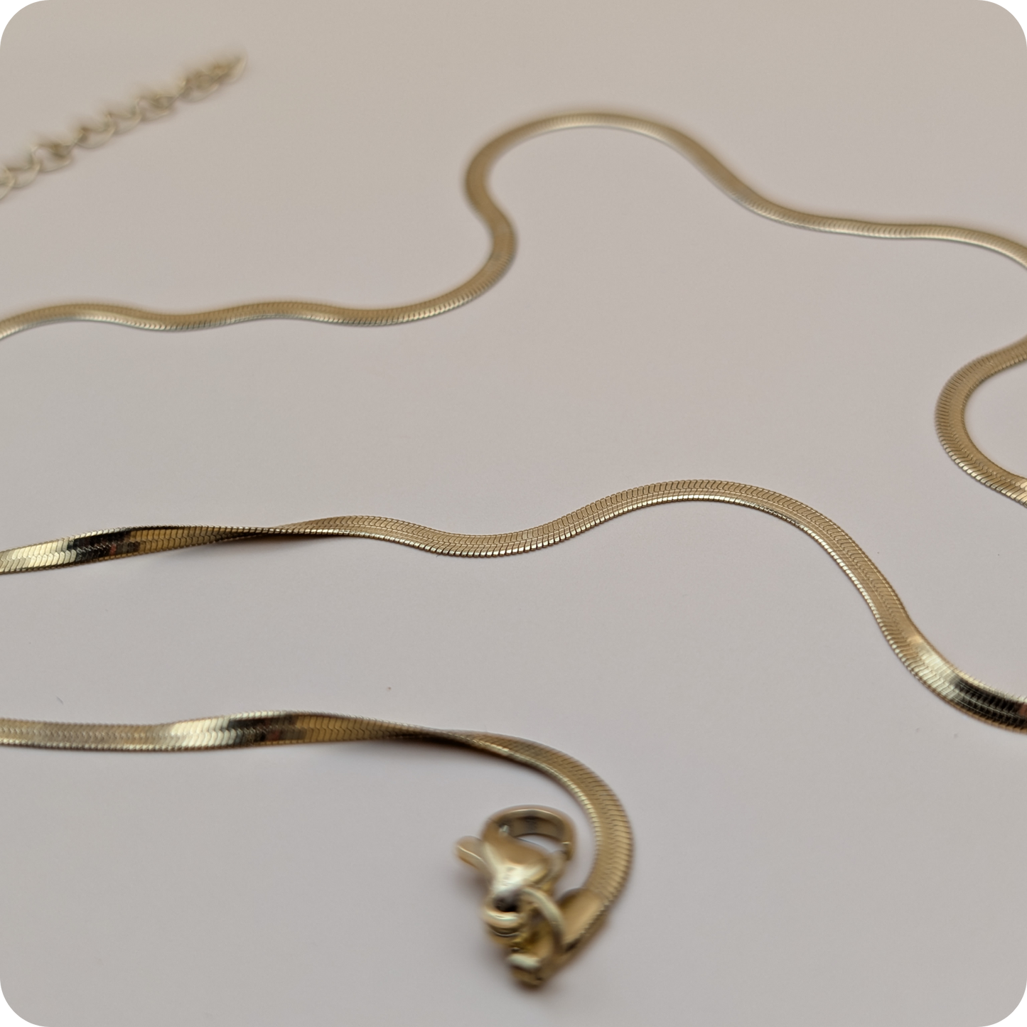 Chaîne plate plaquée or 14 carats