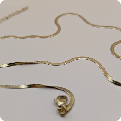 Chaîne plate plaquée or 14 carats