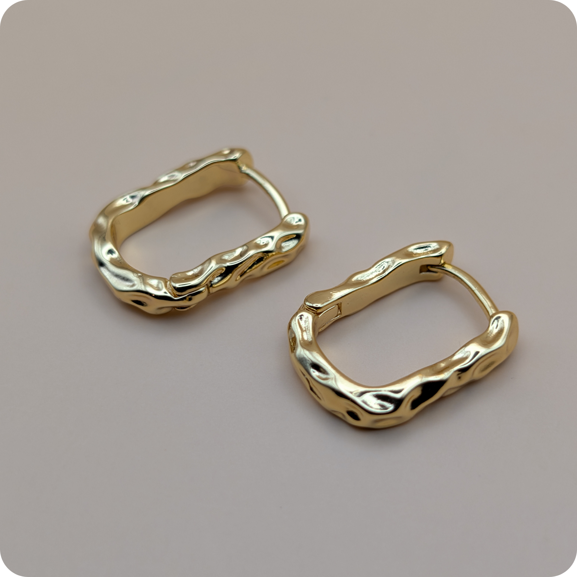 Boucles d'oreilles torsadées plaquées or 14 carats