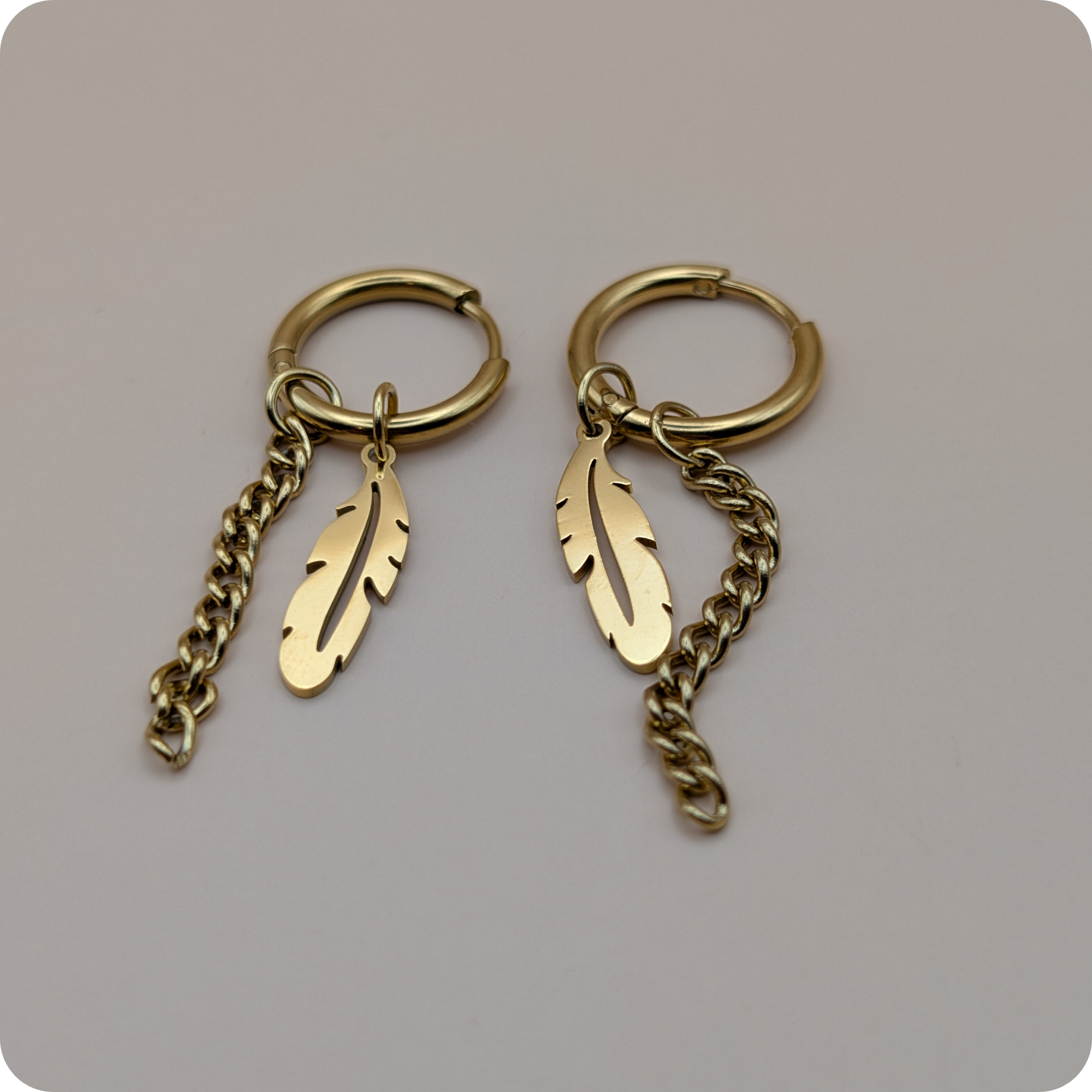 Boucles d'oreilles plumes plaquées or 14 carats
