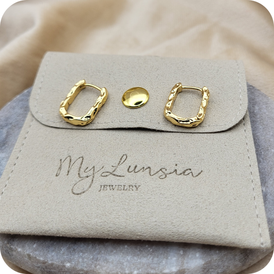 Gold plated curved earrings