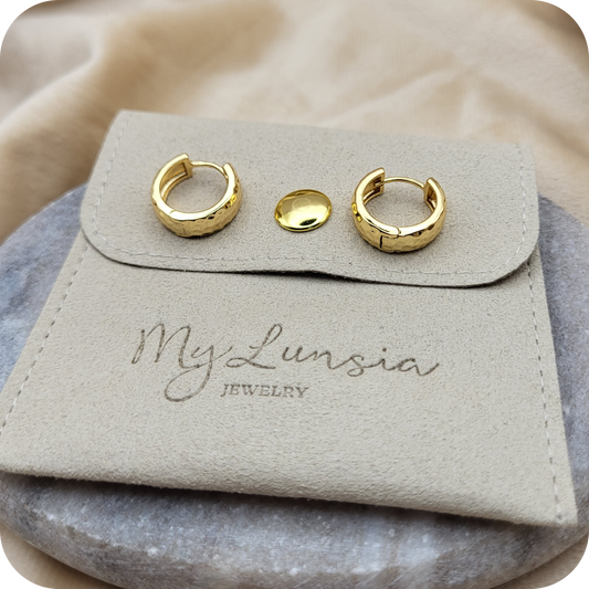 Gold plated dented earrings